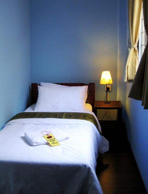 Beds Guesthouse Hostel Кучінг Номер фото